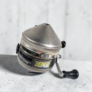 Zebco 33 Rhino Spincast Fishing Reel TESTED Stainless Steel 10lb Line USA c1989